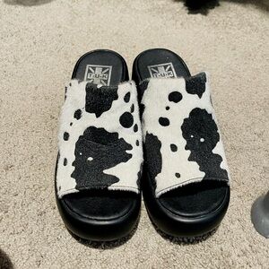 Tuk Black And White Cow Print Platform Mules